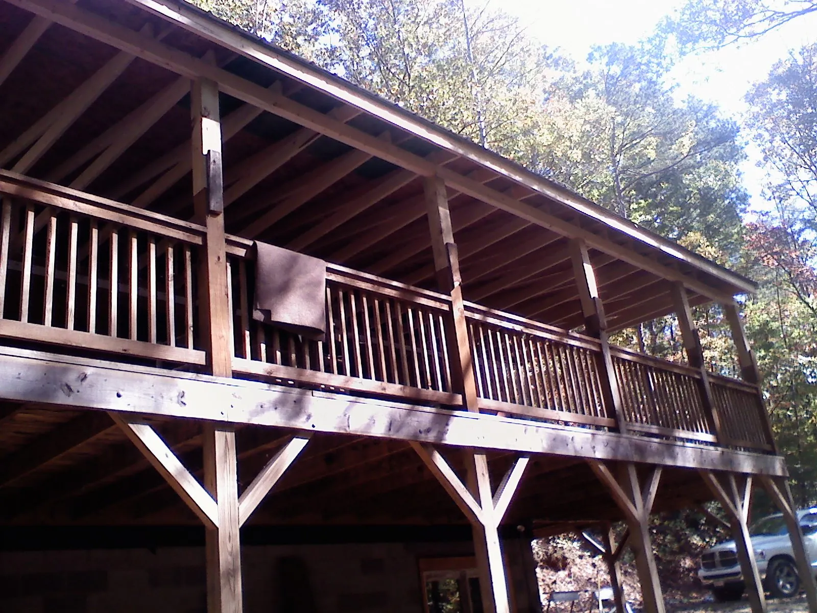 Timber framing under a new elevated porch and deck — Roof Leak Repair in Fabius by Roofing Brothers
